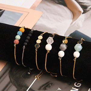 Bracelet is made of rose quartz bead,  white lave Bead and an adjustable brass chain.